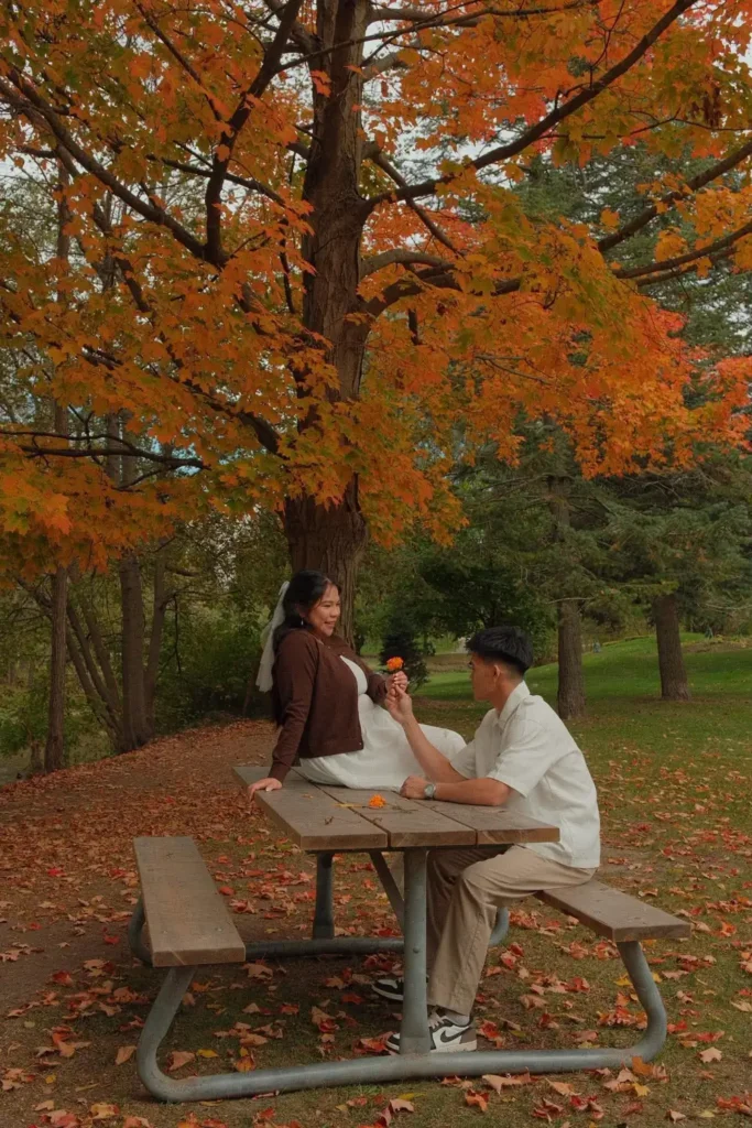 Laughing together at the picnic table